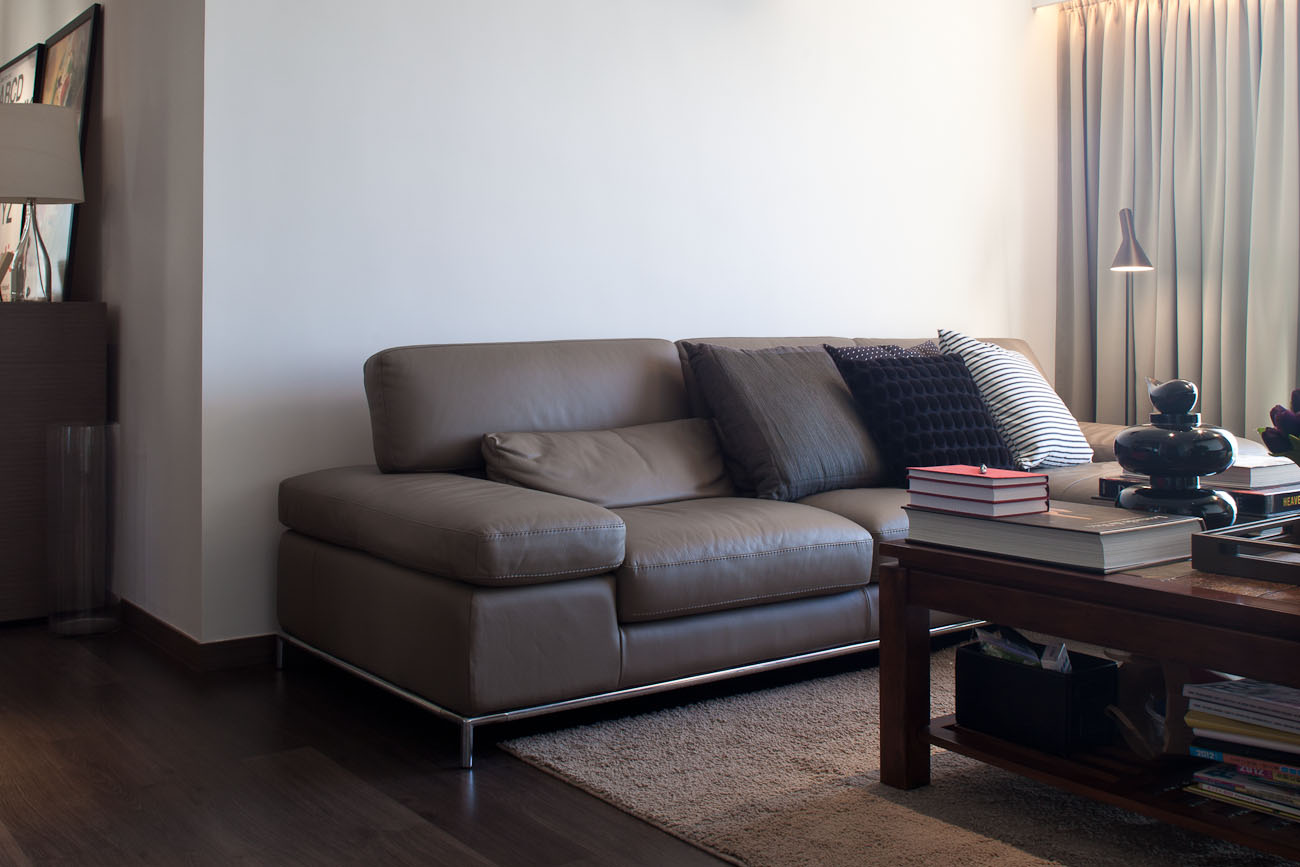 lui design associates designer interior apartment condo residential earth tones wood minimal hong kong china architecture couch italian leather