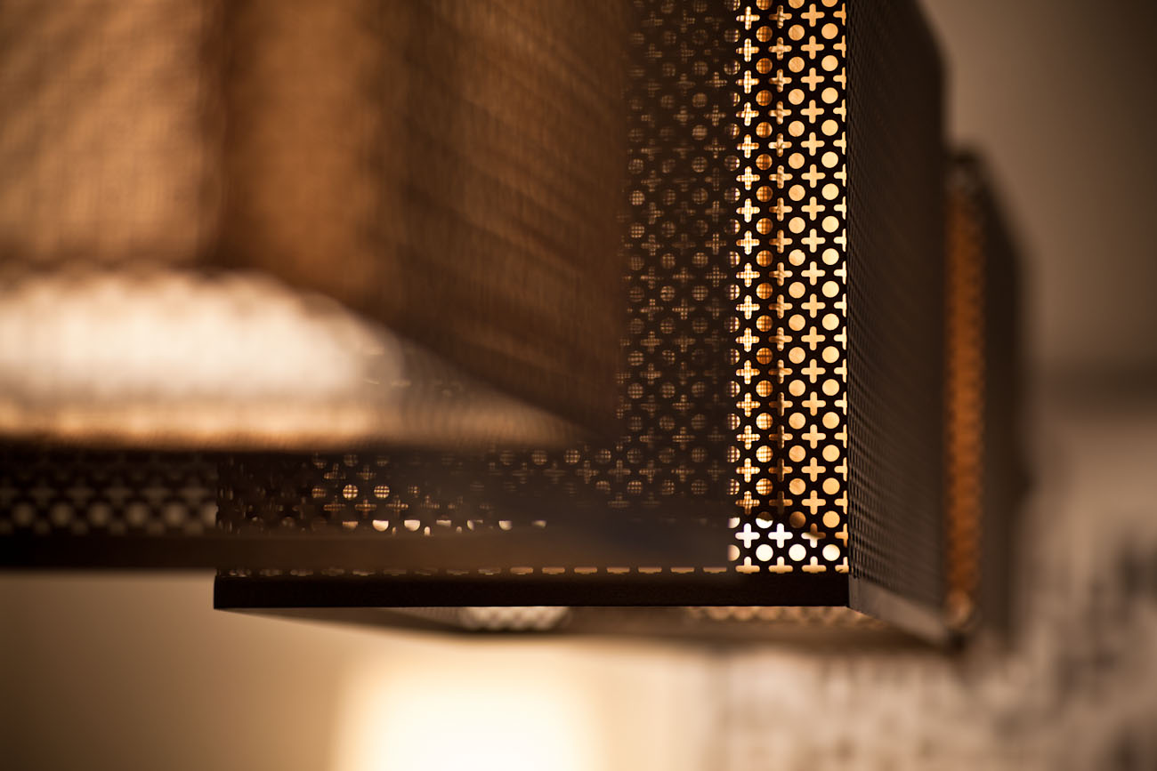 lui design associates designer interior apartment condo residential earth tones wood minimal hong kong china architecture laser cut metal lampshade detail lighting