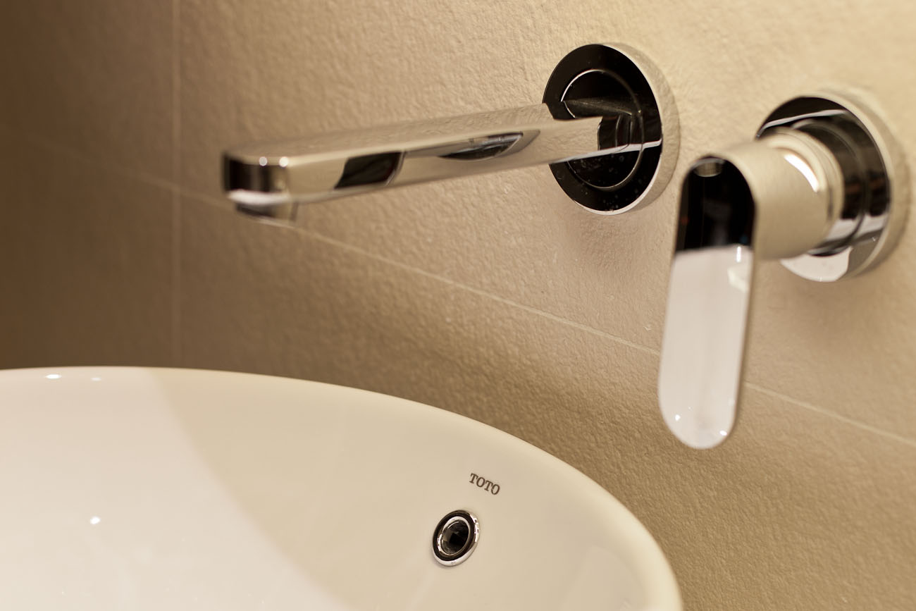 lui design associates designer interior apartment condo residential earth tones wood minimal hong kong china architecture bathroom faucet